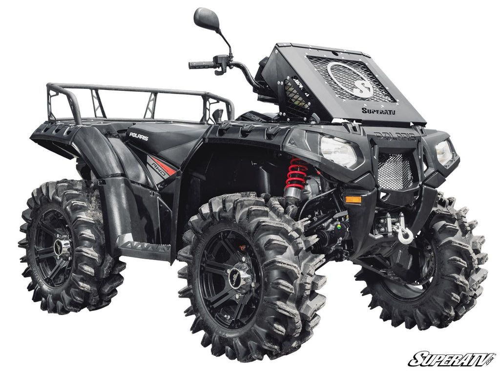 A black Polaris ATV with a 3 Polaris Sportsman XP Lift Kit, large mud tires, a high-mounted SuperATV radiator, sturdy front and rear racks, and red shocks—built for off-road and mudding performance.