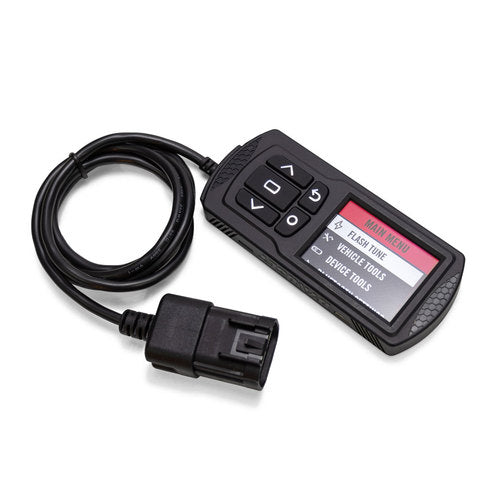 The SXS Performance Tuner - DynoJet® Power Vision features a black body, attached cable with OBD-II connector, screen with menu options (Flash Tune, Vehicle Tools, Device Tools), and five buttons beneath the display. Compatible with Maverick, RZR, Talon, 
