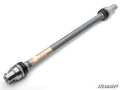 The Can-Am Maverick Trail Heavy-Duty Prop Shaft Rhino Driveline features a gray, cylindrical shaft with metal CV joints at both ends and black, silver, and rubber components. RHINO DRIVELINE is in orange. The SuperATV logo appears on a white background.