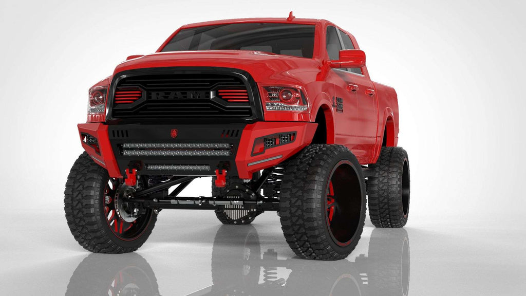 A 2010-2018 Ram 2500 with a bold Identity Front Bumper Full Kit—center section shackle, standard end pods, light pod x2 cubes, accent lights, and black ring—displayed on a clean white background.
