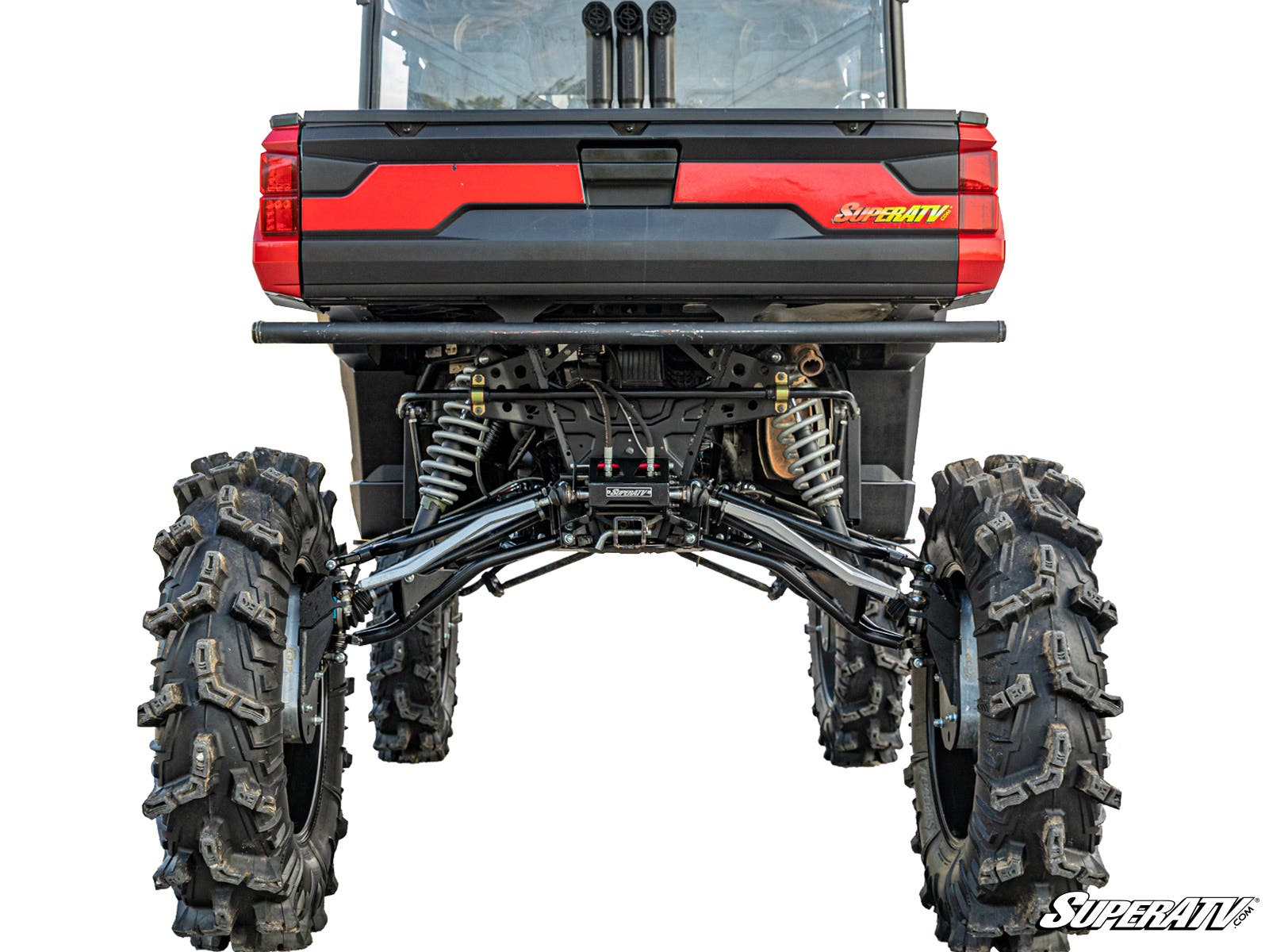 A rear view of a Polaris Ranger XP 1000 featuring the RIDE System Rear Steering Kit, with large rugged tires, exposed suspension, and a black and red body. The SuperATV logo is visible near the tailgate on a white background.