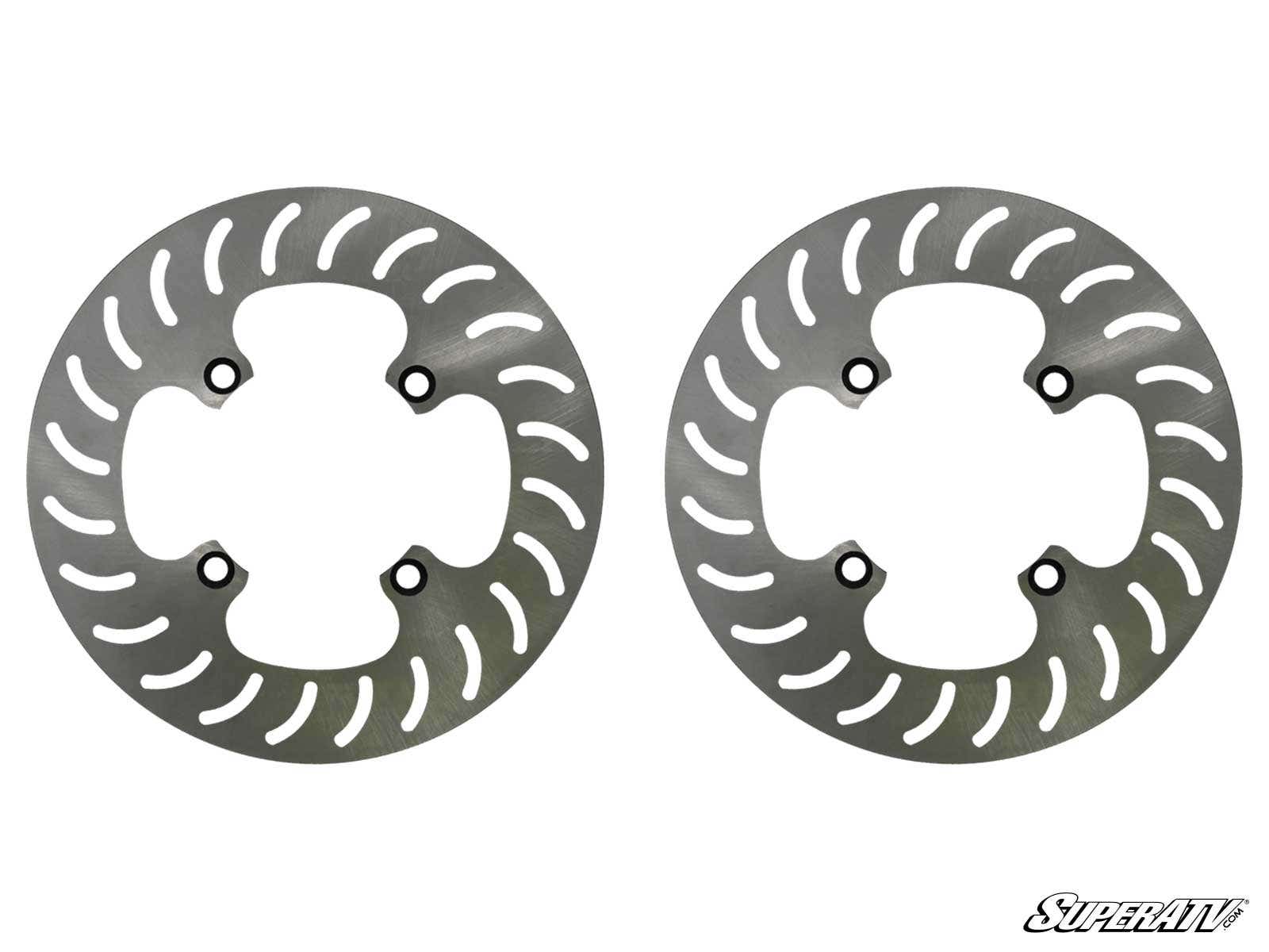 The Replacement Portal Brake Rotor Kit is shown: two silver, circular rotors with spiral ventilation slots and four mounting holes each, side by side on a white background. The SuperATV logo is in the bottom right corner.