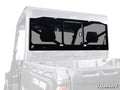 The Can-Am Defender Glass Sliding Rear Windshield features black trim, a secure frame mount, a sliding center window, and displays the SuperATV watermark above the cargo bed. It’s shown installed on the back of a Can-Am utility vehicle.