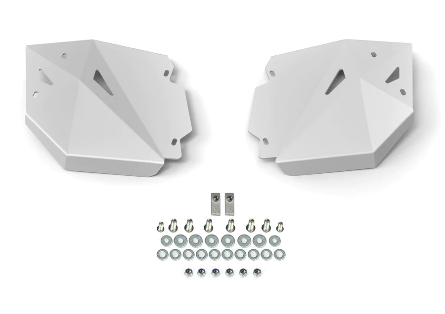 The Can Am Defender HD10 Curved Rear CV Guards Pair, featuring two geometric white metal plates with angular designs, is displayed alongside bolts, nuts, washers, and two small brackets on a plain white background.