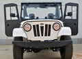 The ROXOR2 Full Hard Enclosure Cab Kit by Hardcabs is shown on a white off-road vehicle, front view, with both doors open. Features include round headlights, black grille, rugged tires, and Mahindra logo; background is plain with concrete ground.