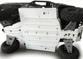 A close-up of a Polaris Ranger 570 / 900 / 1000 XP / Diesel Alloy Full Skidplate Kit shows the large silver skid plate secured with bolts, with rugged knobby tires and parts of the suspension visible around the edges.