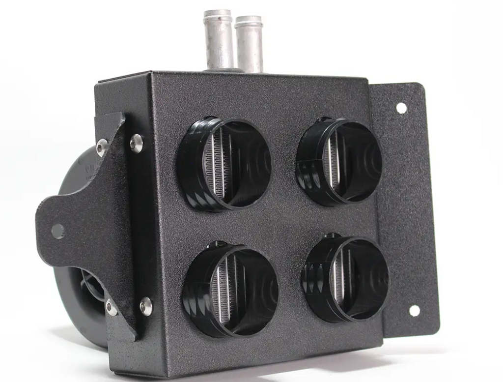 The Polaris RZR XP Turbo Cab Heater with Defrost (2016-2018) is a black metal unit featuring four front circular ports with filter threads, two top cylindrical connectors, a side mounting plate, and a round component on the left against a white background