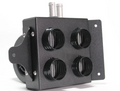 The Polaris RZR XP Turbo Cab Heater with Defrost (2016-2018) is a black metal unit featuring four front circular ports with filter threads, two top cylindrical connectors, a side mounting plate, and a round component on the left against a white background