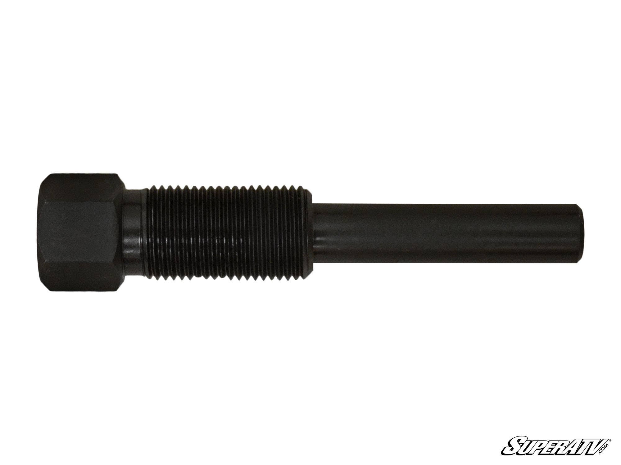 A black metal Secondary Drive Clutch Puller with a hex head and long threaded shaft lies horizontally on a white background. The right end is smooth and cylindrical, and the bottom right corner displays a white SuperATV logo.