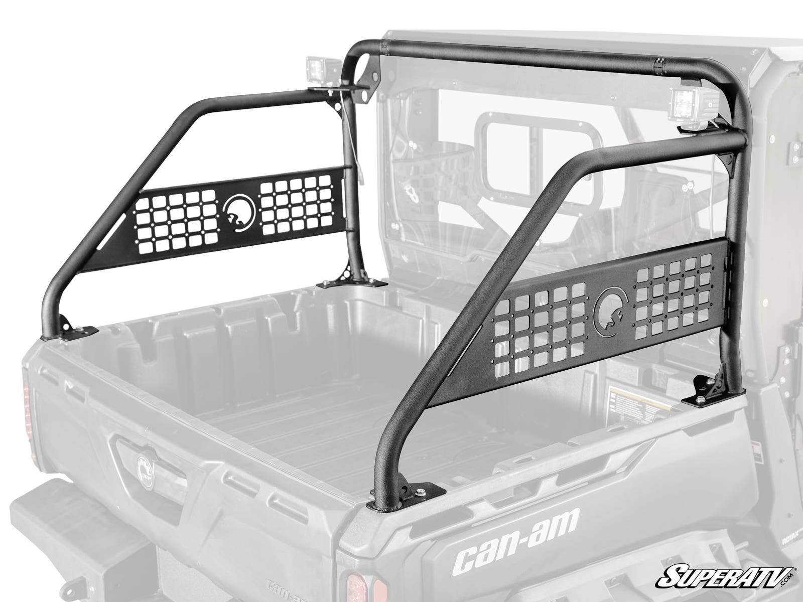 A Can-Am Defender Sport Accessory Bar, featuring black metal construction, mesh panels, cut-out grid designs, and a circular emblem, is installed in the cargo bed of a Can-Am utility vehicle against a white background.
