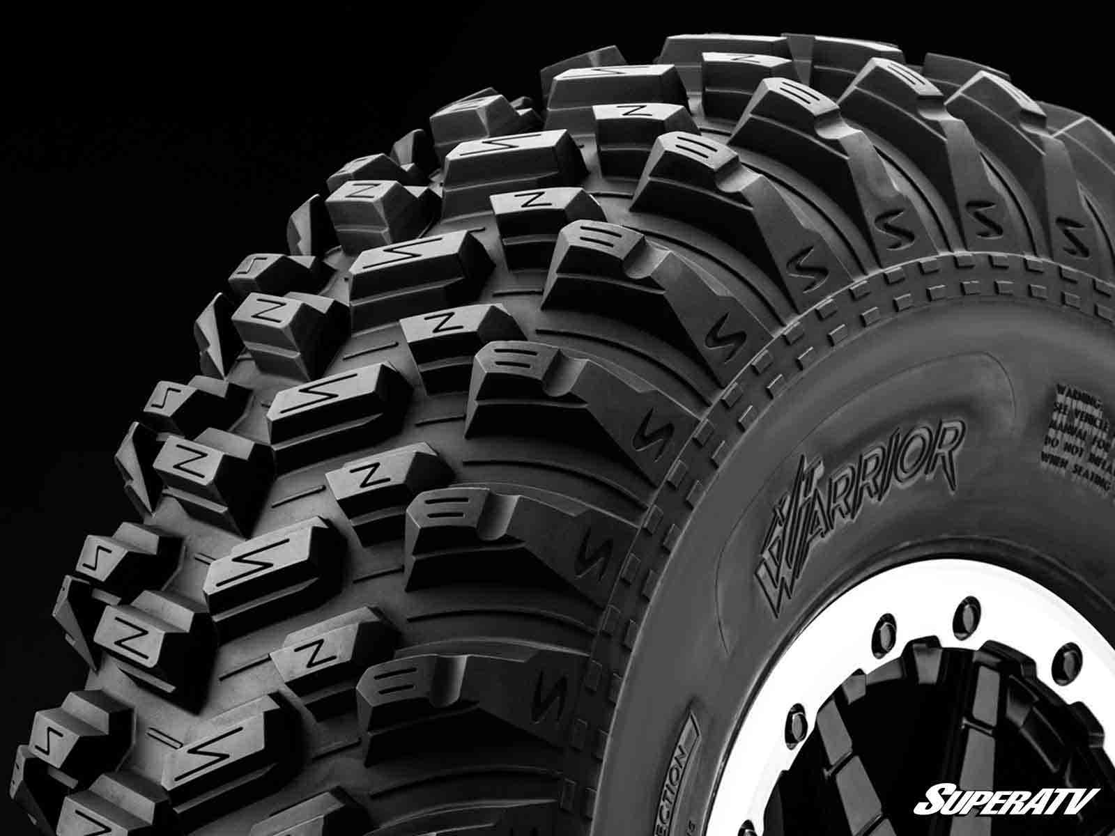 Standard XT Warrior Tires 32x10x15 on 15x10 Assault Industries Hellfire Matte Titanium Wheels 4/136 Pattern - Offroad Armor
