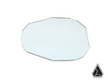 The Assault Industries Bomber/B2/Aviator Series Side Mirror Replacement Glass, featuring beveled, frameless, irregular shaping and a small black geometric triangle logo in the lower right corner, is displayed on a plain white background.