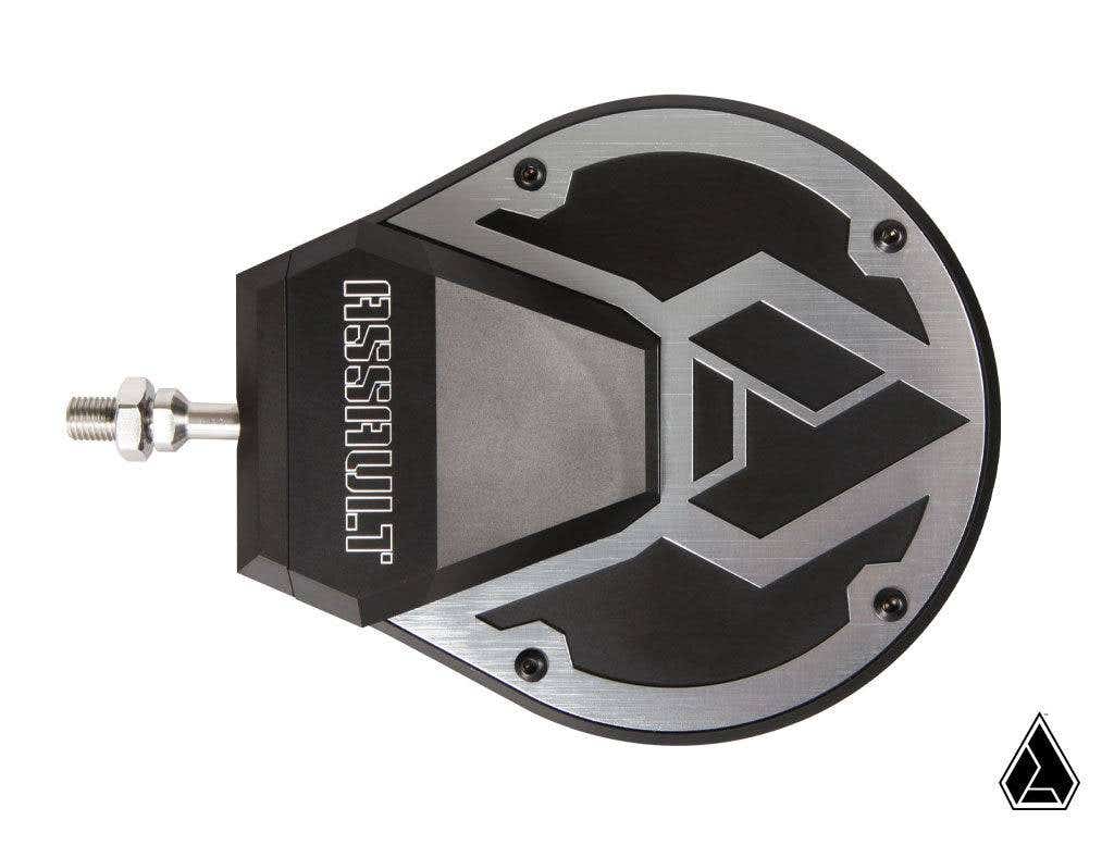 The Assault Industries Sidewinder Convex Side Mirror is a black and silver metallic, teardrop-shaped mirror with ASSAULT engraved on the left, angular geometric patterns, a bolted side connector, and a triangular logo in the bottom right. White background