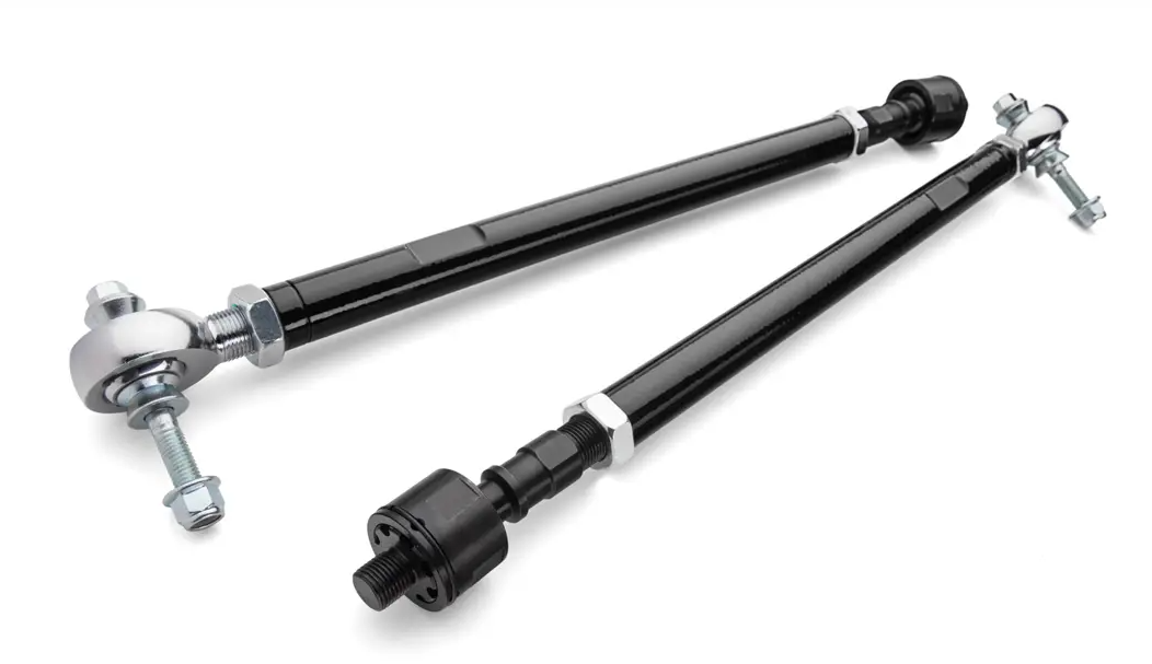 The Honda Talon 1000 Rack Boss 2.0 Steel Bar Tie Rod Kit includes two black metal adjustable tie rods with threaded ends, bolts, and lock nuts. Each rod features metallic joints on one end and black cylindrical parts, designed for automotive use.