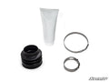 The Rhino Driveline C-Series Prop Shaft Replacement Boot Kit is displayed on a white background, featuring a black rubber boot, a white tube of grease, and two silver clamps. The SuperATV logo appears in the bottom right corner.