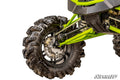 Close-up of a Textron Wildcat XX 6 Portal Gear Lift’s front left wheel with deep tread tires, visible suspension, disc brake, axle, and green chassis parts. Image has a white background with the “SuperATV” logo in the corner.