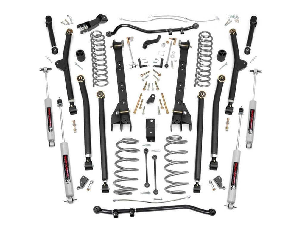 The 6 Inch Lift Kit | Long Arm for Jeep Wrangler TJ 4WD (1997-2006) is displayed on a white background, featuring coil springs, shocks, control arms, sway bars, brackets, and hardware arranged neatly for easy viewing.