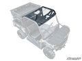 A semi-transparent illustration of a utility terrain vehicle (UTV) showcases the Tracker 800SX Tinted Roof with a clear panel, visible seats, rugged tires, and a cargo bed. The SuperATV logo is displayed in the bottom right corner.