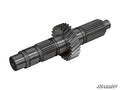 A Polaris Transmission Gear Reduction Kit shaft with cut gears and splined sections, two large helical gears near the center, and precision-machined surfaces. White background with the SuperATV logo in the bottom right corner.