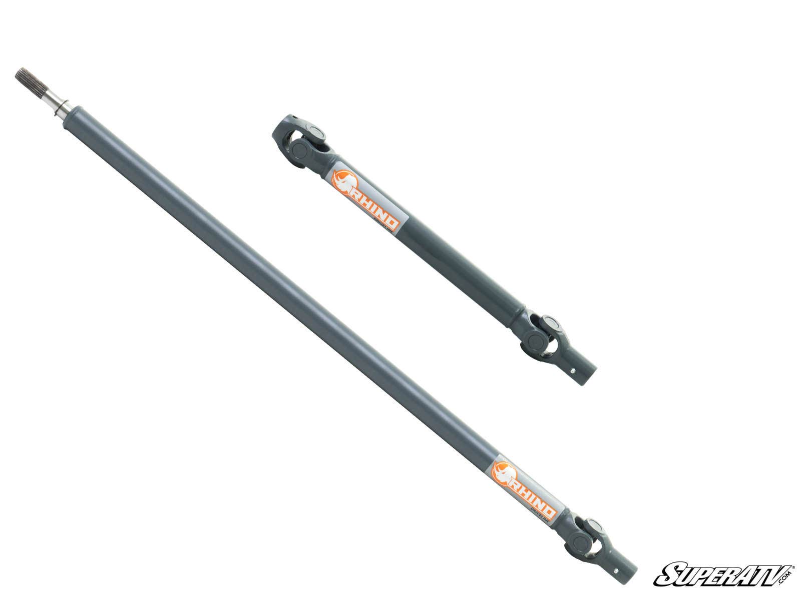 Two gray metal Polaris RZR 900 Heavy-Duty Prop Shaft Rhino Driveline shafts, one long and one short, with orange Rhino labels and universal joints at the ends are displayed on a white background. The SuperATV logo appears in the bottom right corner.
