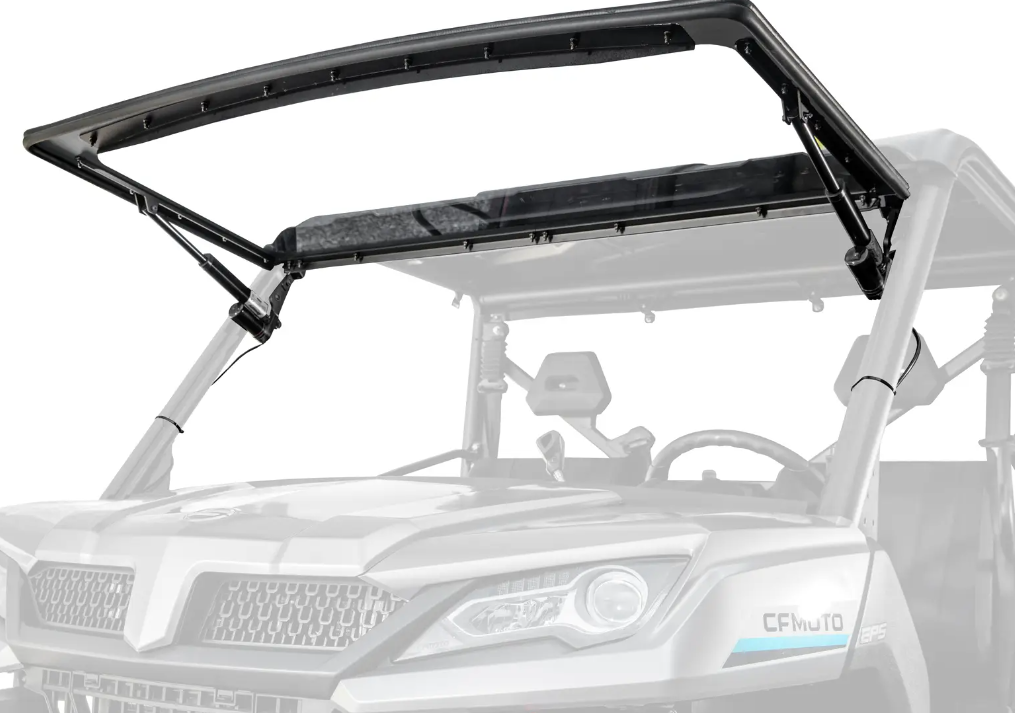 A CFMoto UForce 1000 Maxdrive Power Flip Windshield, tinted polycarbonate and partially open with dual gas struts, is mounted on a gray utility vehicle, revealing the front grille, headlights, and part of the interior.