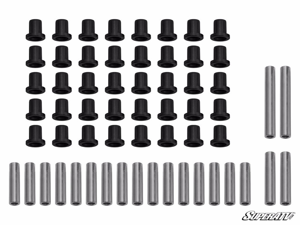 A set of Polaris Ranger 900 Diesel A-Arm Bushings: 32 black bushings in a grid above 16 silver sleeves, with 2 longer silver tubes to the right. The SuperATV logo appears in white at the lower right corner.