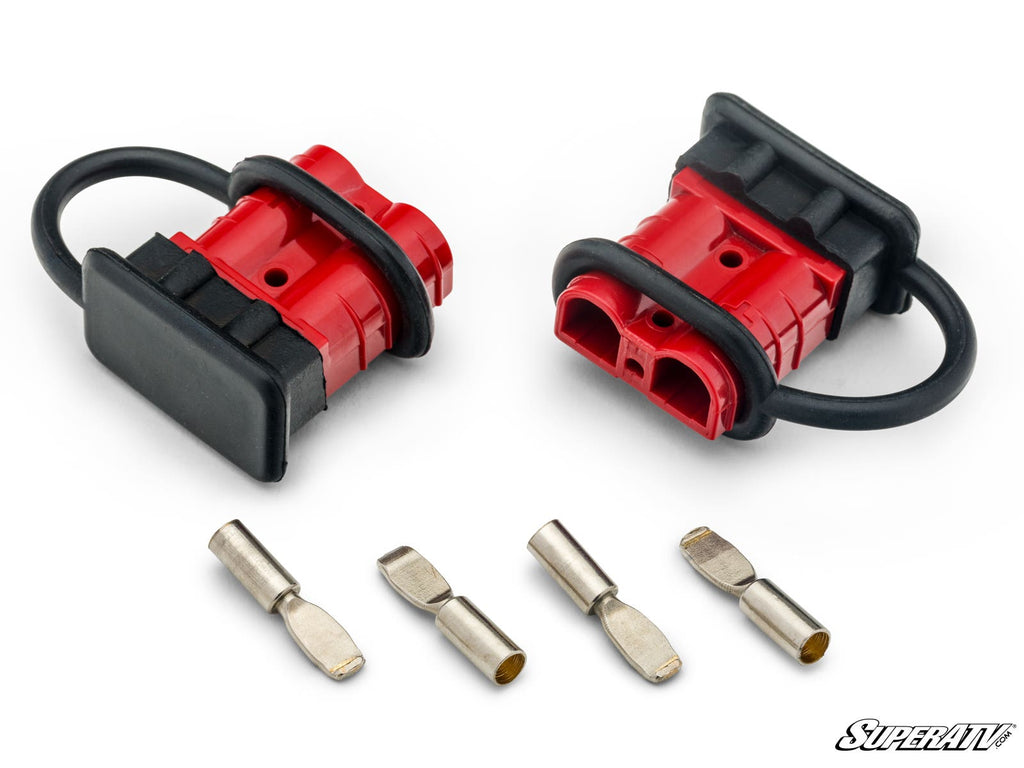 Two red and black electrical connectors with black rubber gaskets from the All-in-One Quick Connect Winch Kit with 4,500 LB Winch are shown above four metallic terminal pins on a white background, the SuperATV logo visible in the lower right corner.