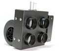 A close-up of the Inferno Cab Heater Kit With Defrost for 2014-Current Yamaha Viking shows a black metal box with four front vents, visible screws, a round blower unit behind it, and two clear tubes on top for an industrial look.