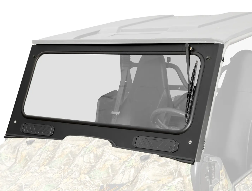 A Yamaha Wolverine X2/X4 Glass Windshield with a black frame and vent is installed on an off-road vehicle featuring a camouflage hood, visible interior, and a partially shown white roof.