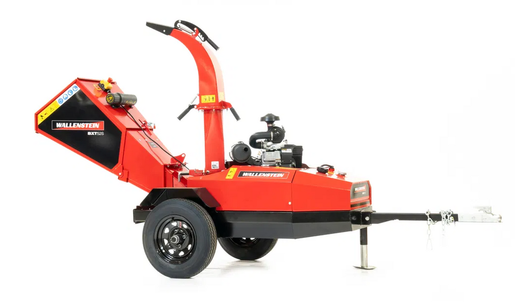 The ATV/UTV Towable Wood Chipper BXT52S, in red and black, features a side chute, engine, wheels with black tires, tow hitch, visible levers and labels—all shown from the side on a white background.