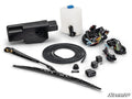 The Electric UTV Windshield Wiper Kit for SuperATV MaxDrive Power Flip Glass Windshields is shown laid out with a black fluid reservoir, white washer tank with blue cap, wiring, wiper arm and blade, nozzle, tubing, relays, switches, and connectors. SuperA