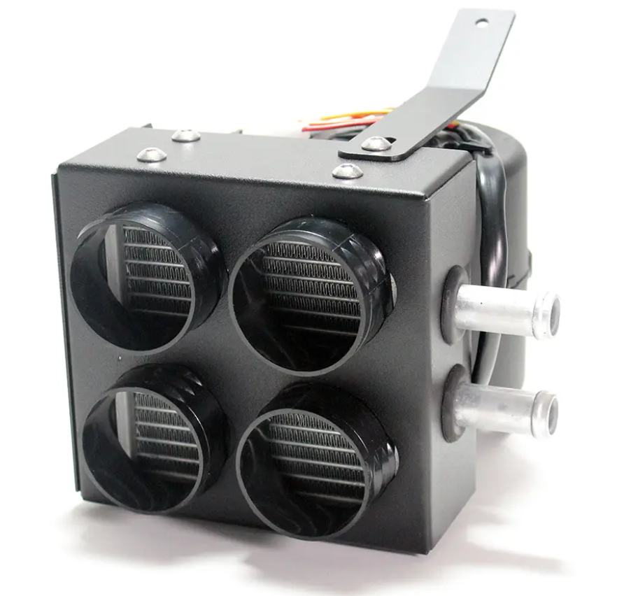 The Inferno Cab Heater Kit With Defrost for 2017-Current Can-Am Maverick X3 features a compact black in-dash unit with four circular air vents, internal metal fins, two silver side pipes, rear wires, and a top-mounted metal bracket.