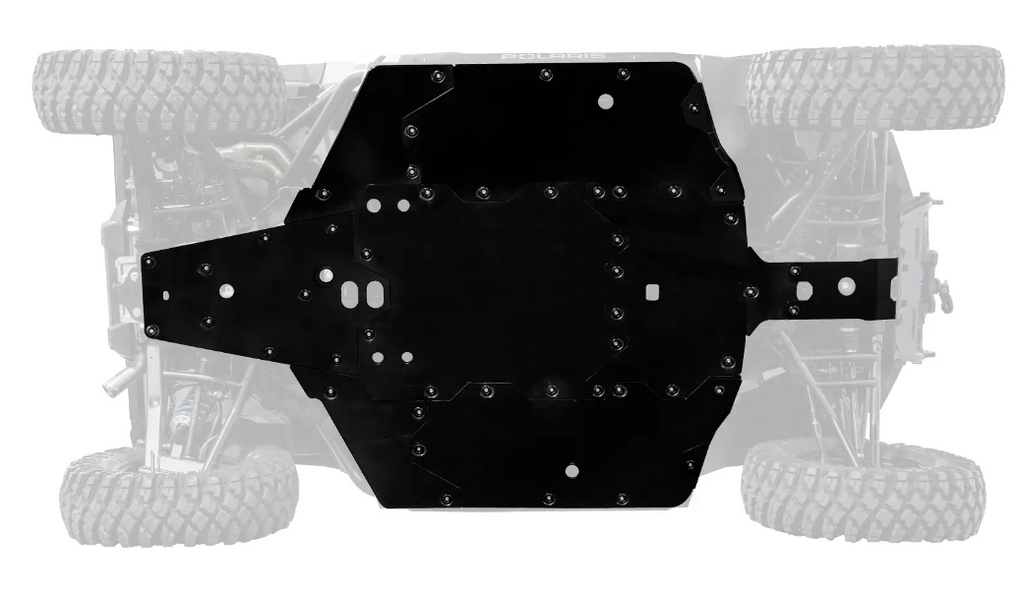 Top view of the Polaris Xpedition Full Skid Plate protecting the center and front chassis of an off-road vehicle. Rugged tires and suspension parts are visible behind the black plate, showcasing enhanced underbody protection.