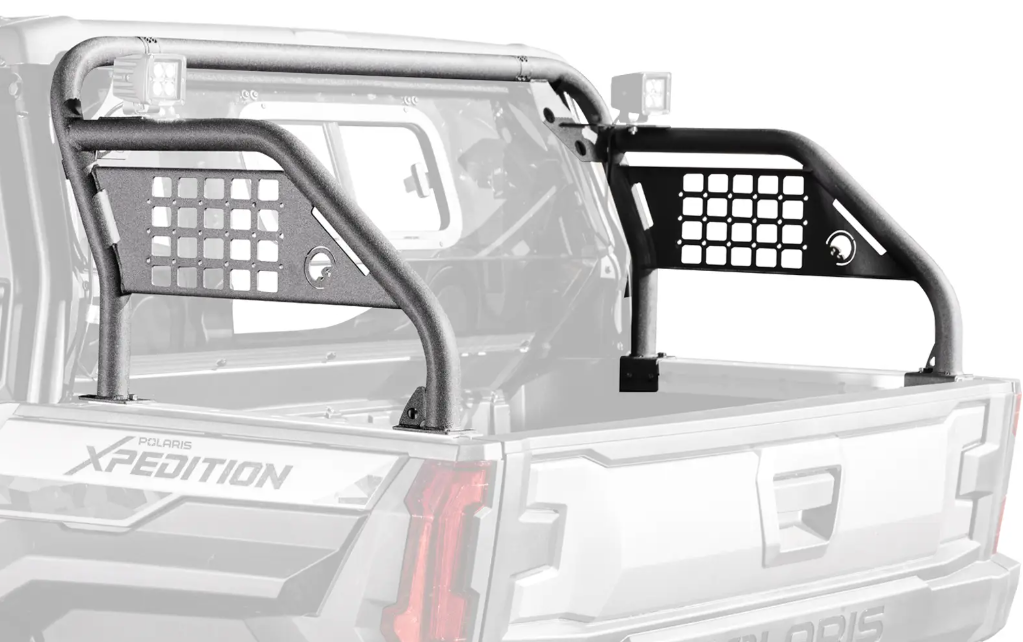 A Polaris Xpedition XP Sport Accessory Bar, made of black tubular steel with mesh panels, is mounted in the bed of a Polaris Xpedition pickup. It features two square LED lights on top and mesh cutouts for gear tie-downs; truck details are in grayscale.