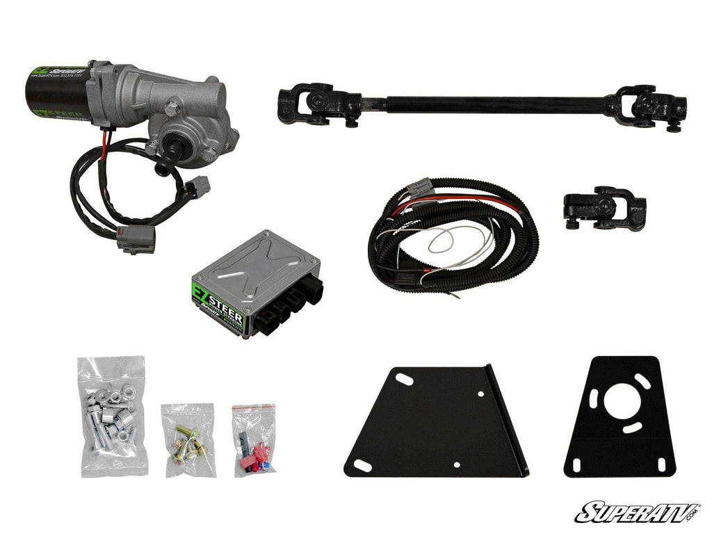 The Yamaha Viking Power Steering Kit is displayed on a white background, featuring an electric motor assembly, control module, wiring harness, universal steering shaft with joints, mounting plates, bagged hardware, and the SuperATV logo in the bottom righ