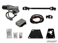 The Yamaha Viking Power Steering Kit is displayed on a white background, featuring an electric motor assembly, control module, wiring harness, universal steering shaft with joints, mounting plates, bagged hardware, and the SuperATV logo in the bottom righ
