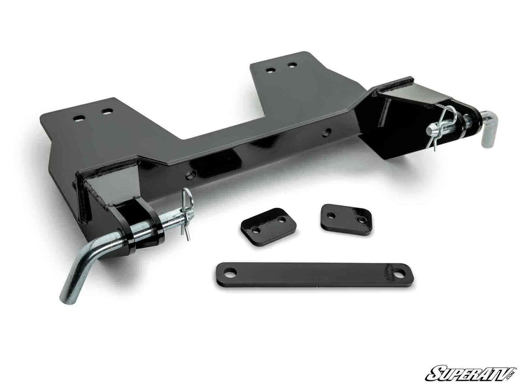 The Yamaha Viking Plow Pro Snow Plow Mount is shown disassembled on a white background, featuring black metal brackets, two large mounting holes, latch pins, small rectangular plates, and an elongated flat bar. The SuperATV logo appears in the lower right