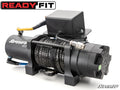 The Polaris RZR XP 1000 Ready-Fit Winch features a thick synthetic cable on its spool, a motor housing with connected wires, and a control box on top. SuperATV and READYFIT branding are visible. The black winch is shown against a white background.