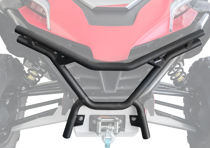 Close-up of the CF Moto ZForce 950 Sport Front Bumper, a black tubular metal bumper with angled bars, mounted on an off-road vehicle with a red hood, visible suspension springs, winch, and rugged tires for added protection.